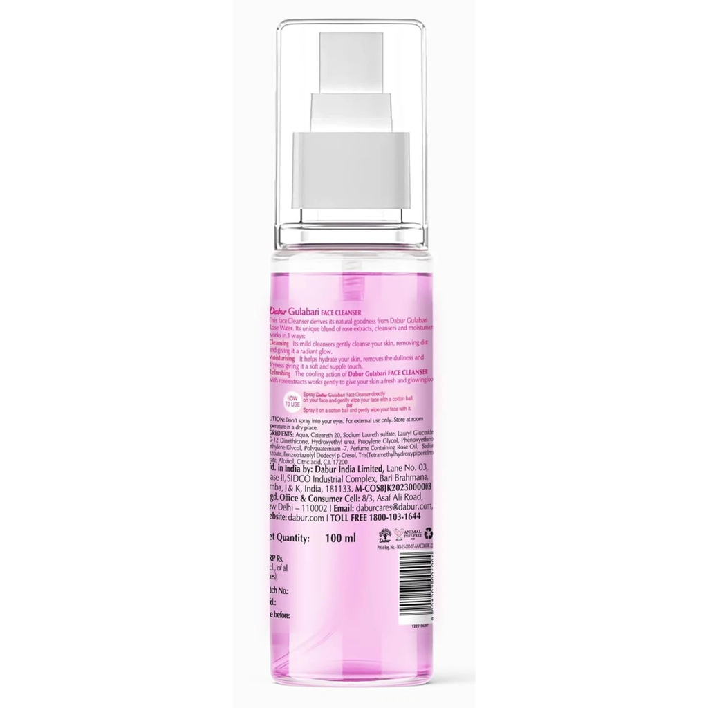 Pink spray bottle with a white label on a white background