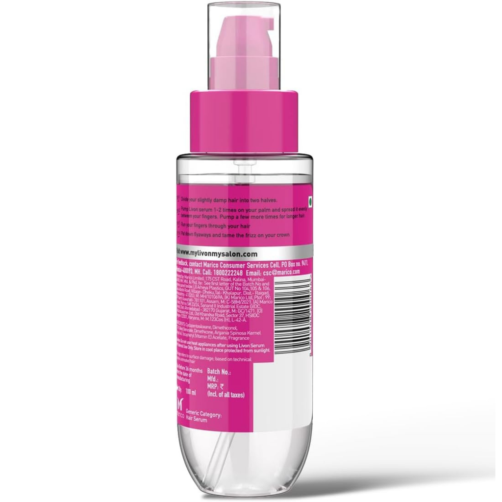 Clear bottle with pink label and pump on a white background
