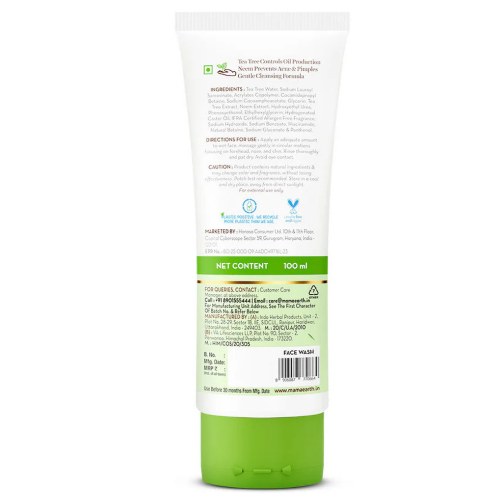 Green and white tube of face wash with label on a white background