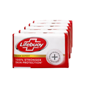 Multiple Lifebuoy soap bars stacked on a white background