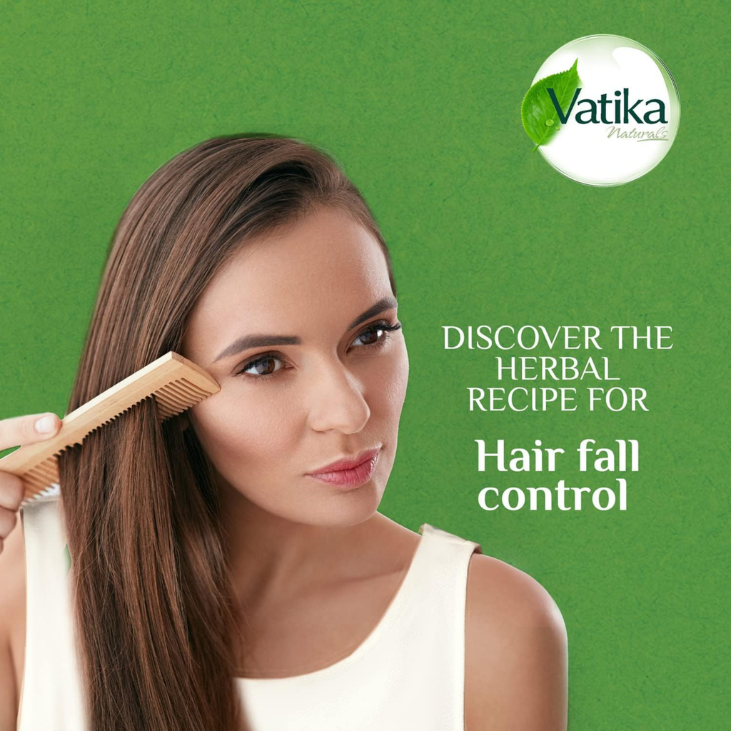 Woman combing her hair with a green background and Vatika logo promoting herbal hair fall control.