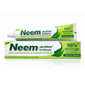 Two tubes of Neem active Toothpaste on a white background