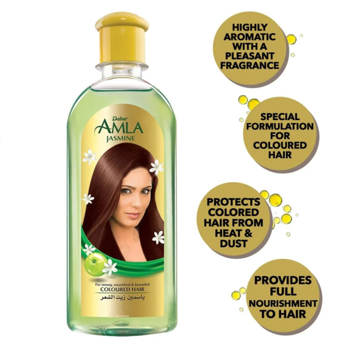 Bottle of Dabur Amla Jasmine hair oil with product features on a white background