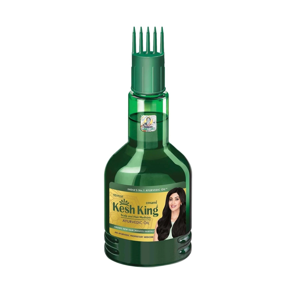 Green bottle of Kesh King hair oil with a comb on a white background