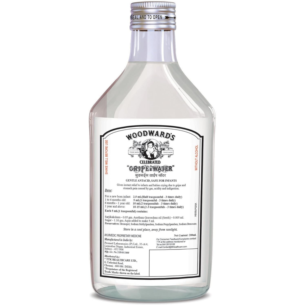 Clear bottle with a label of Woodward's Gripewater on a white background