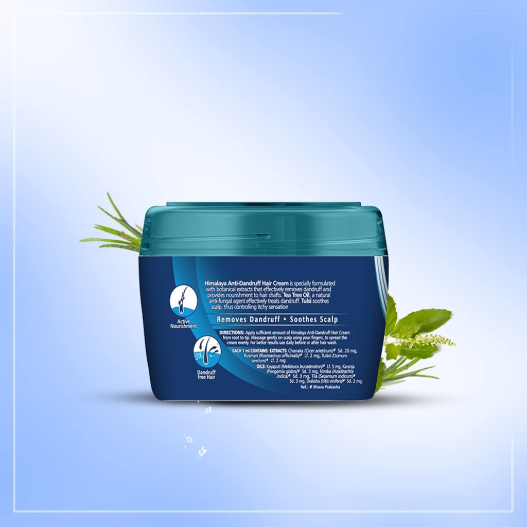 Blue jar of hair care product with green leaves on a light blue background